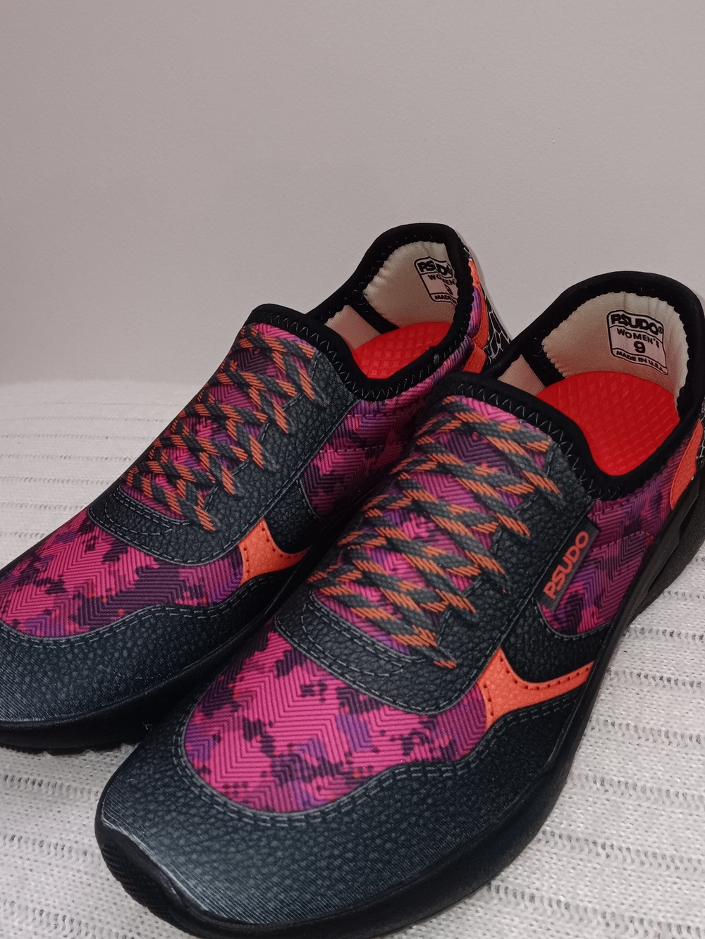 Psudo Pink Camo CourtWomen's Slip-On Sneakers in Pink & Black with Orange Accent